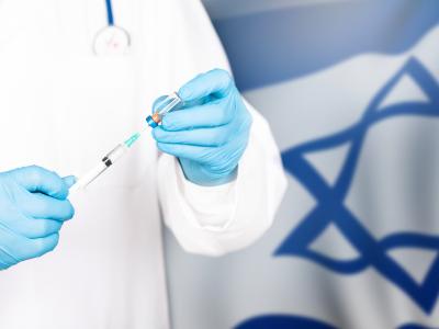 Doctor preparing for vaccination. Vaccination in Israel to protect against Covid-19.